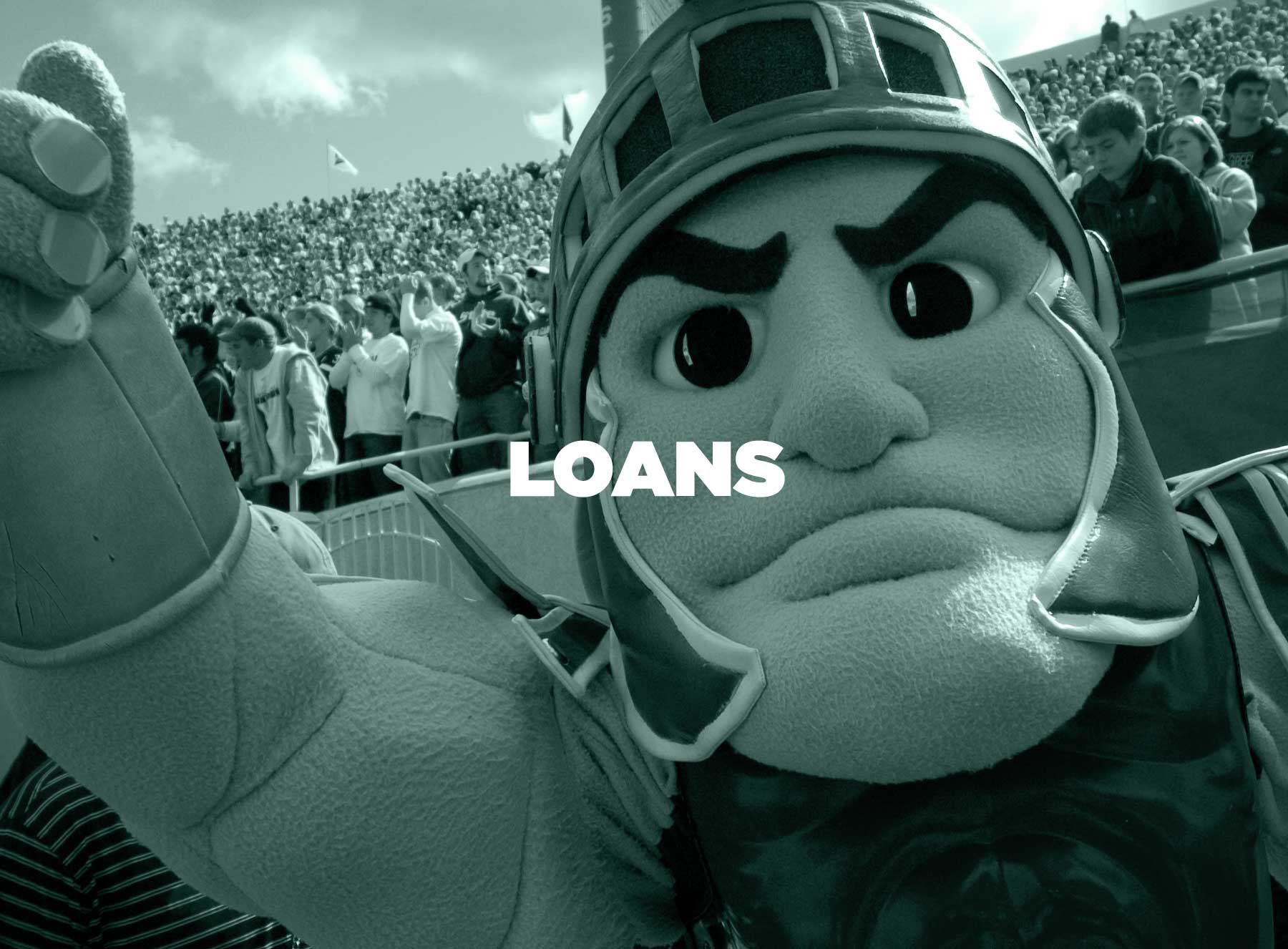 Sparty cheering at a football game